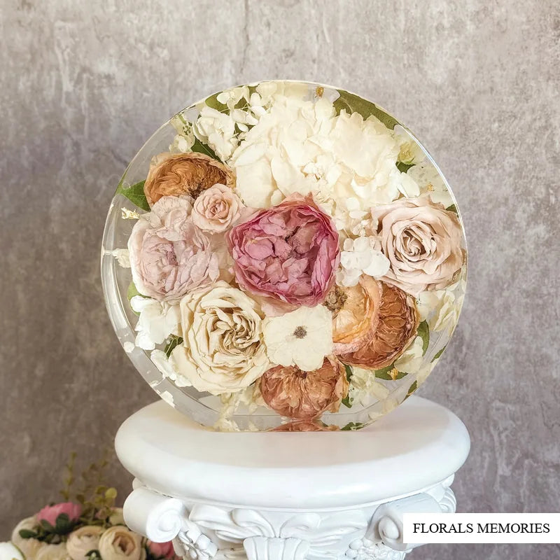 Round resin block wedding bouquet keepsake showing preserved flowers sealed for long display