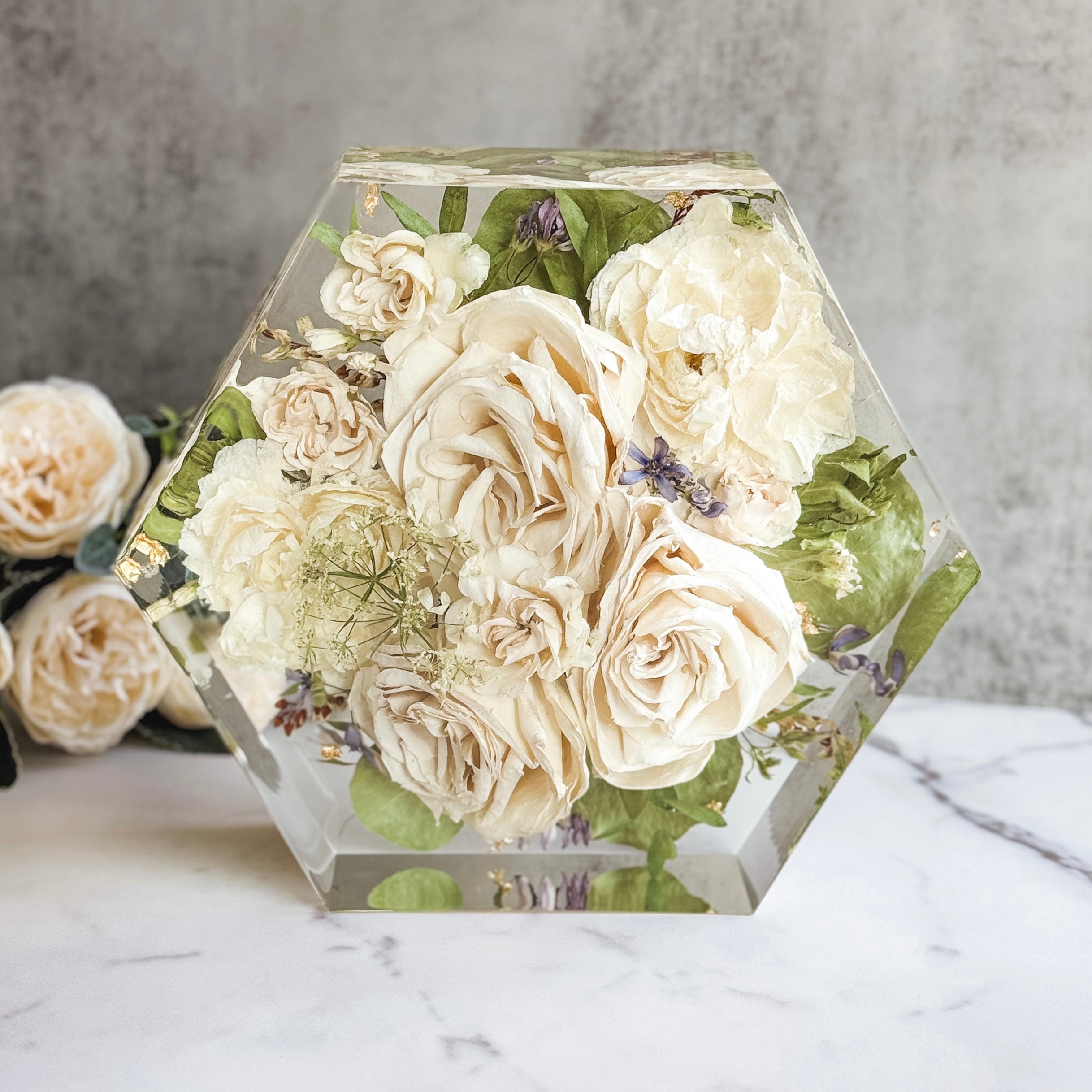 Resin hexagon block keepsake made from a preserved wedding bouquet