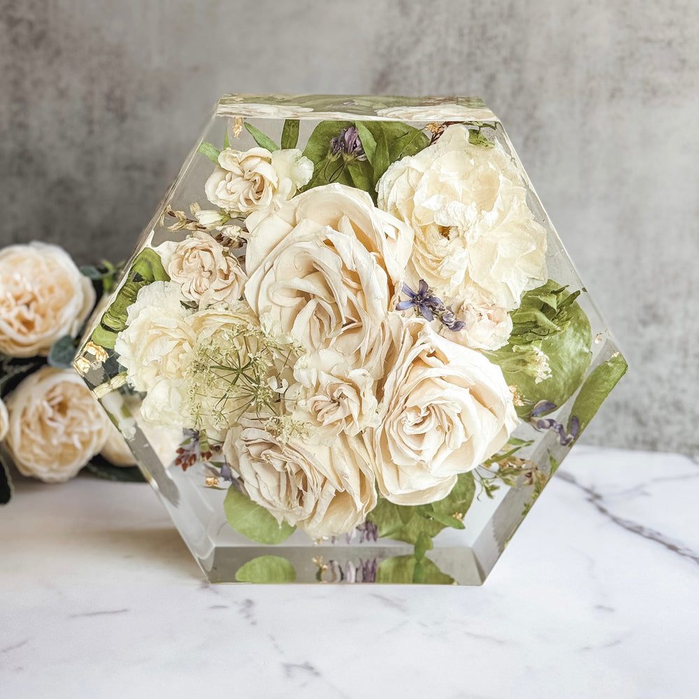 Resin hexagon block keepsake made from a preserved wedding bouquet