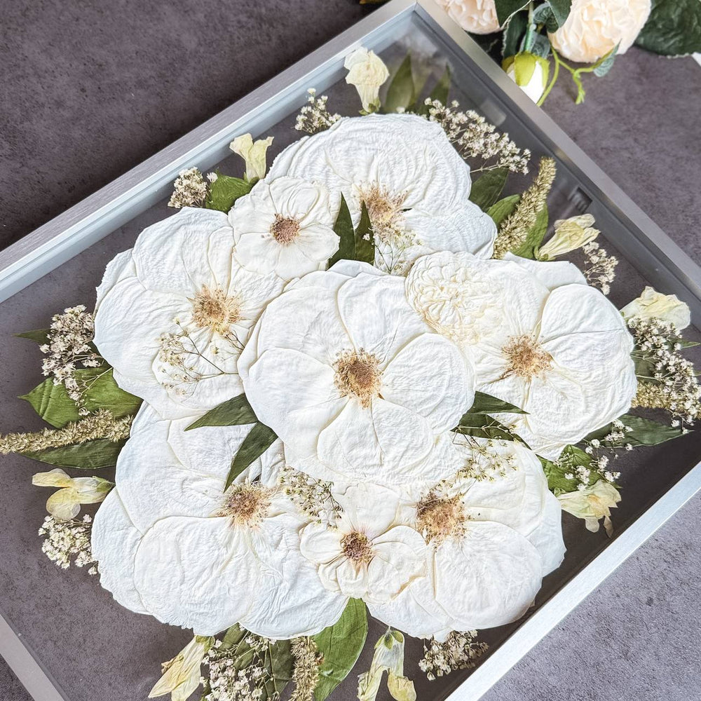 Pressed flower frame keepsake made from a preserved wedding bouquet
