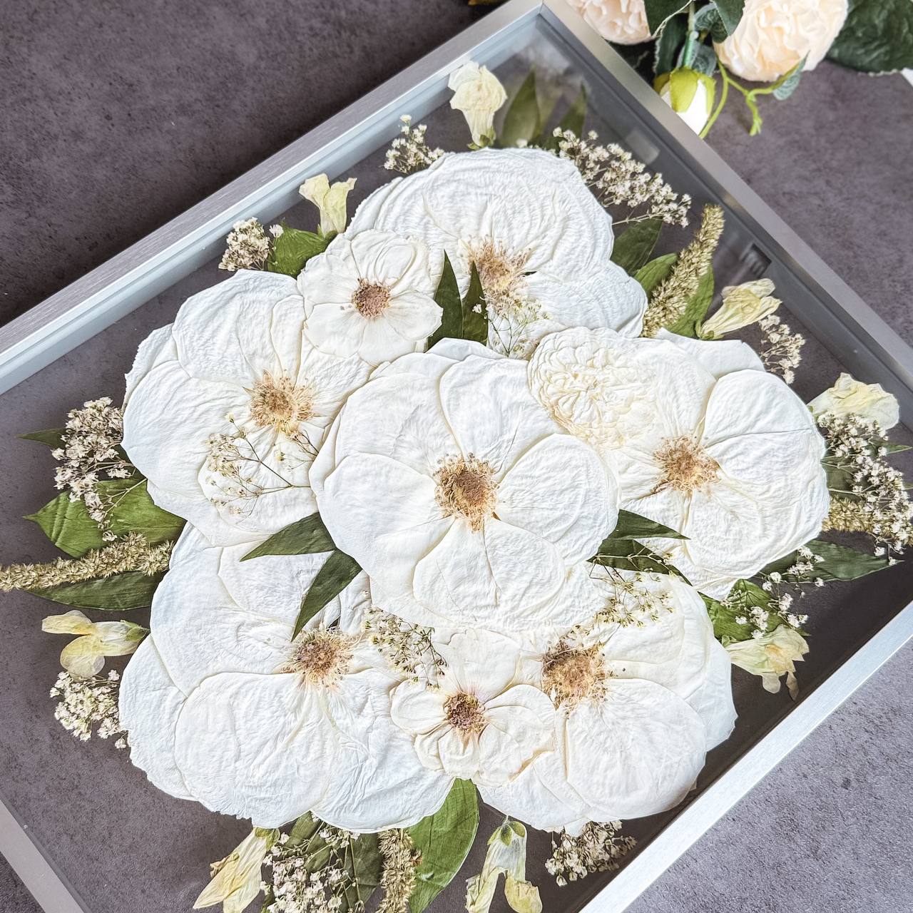 Framed pressed flowers from real wedding bouquet