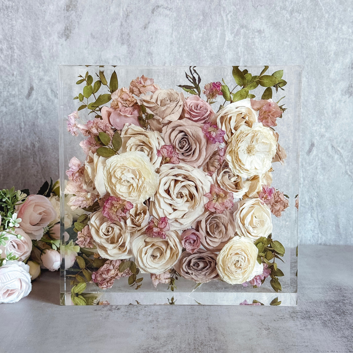 Here we share some of our most recent flower preservation pieces created for real clients. Each bouquet is carefully preserved in resin, frames, or shadow boxes to turn meaningful flowers into lasting keepsakes. Browse our latest preserved bouquets and see how wedding flowers can be transformed into beautiful, long-lasting artwork.