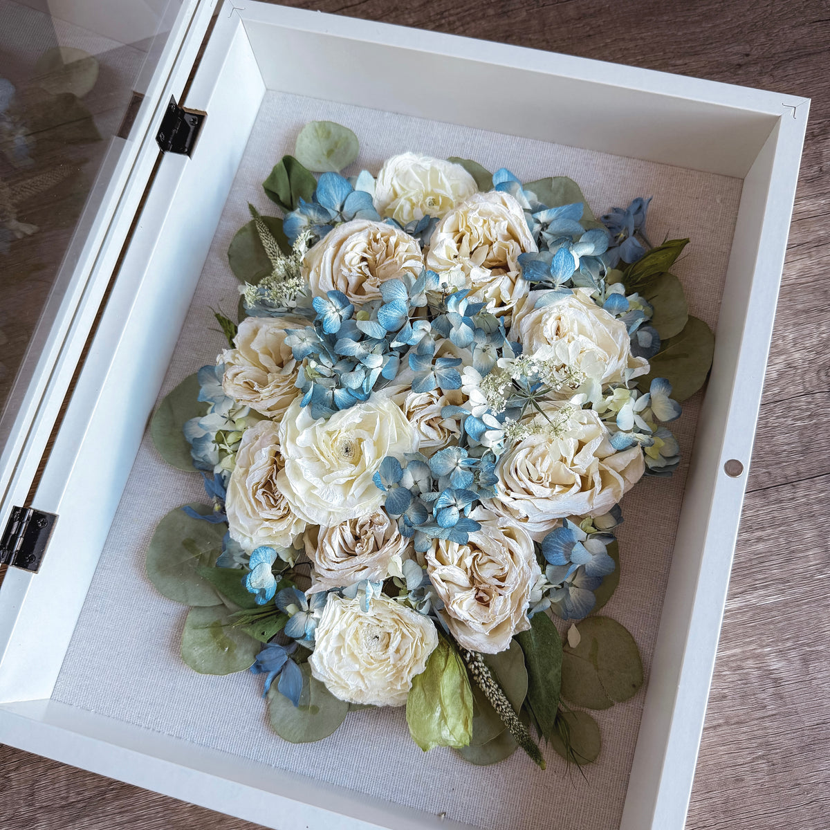 Here we share some of our most recent flower preservation pieces created for real clients. Each bouquet is carefully preserved in resin, frames, or shadow boxes to turn meaningful flowers into lasting keepsakes. Browse our latest preserved bouquets and see how wedding flowers can be transformed into beautiful, long-lasting artwork.